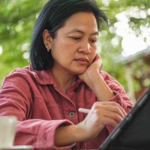 Woman working on tablet